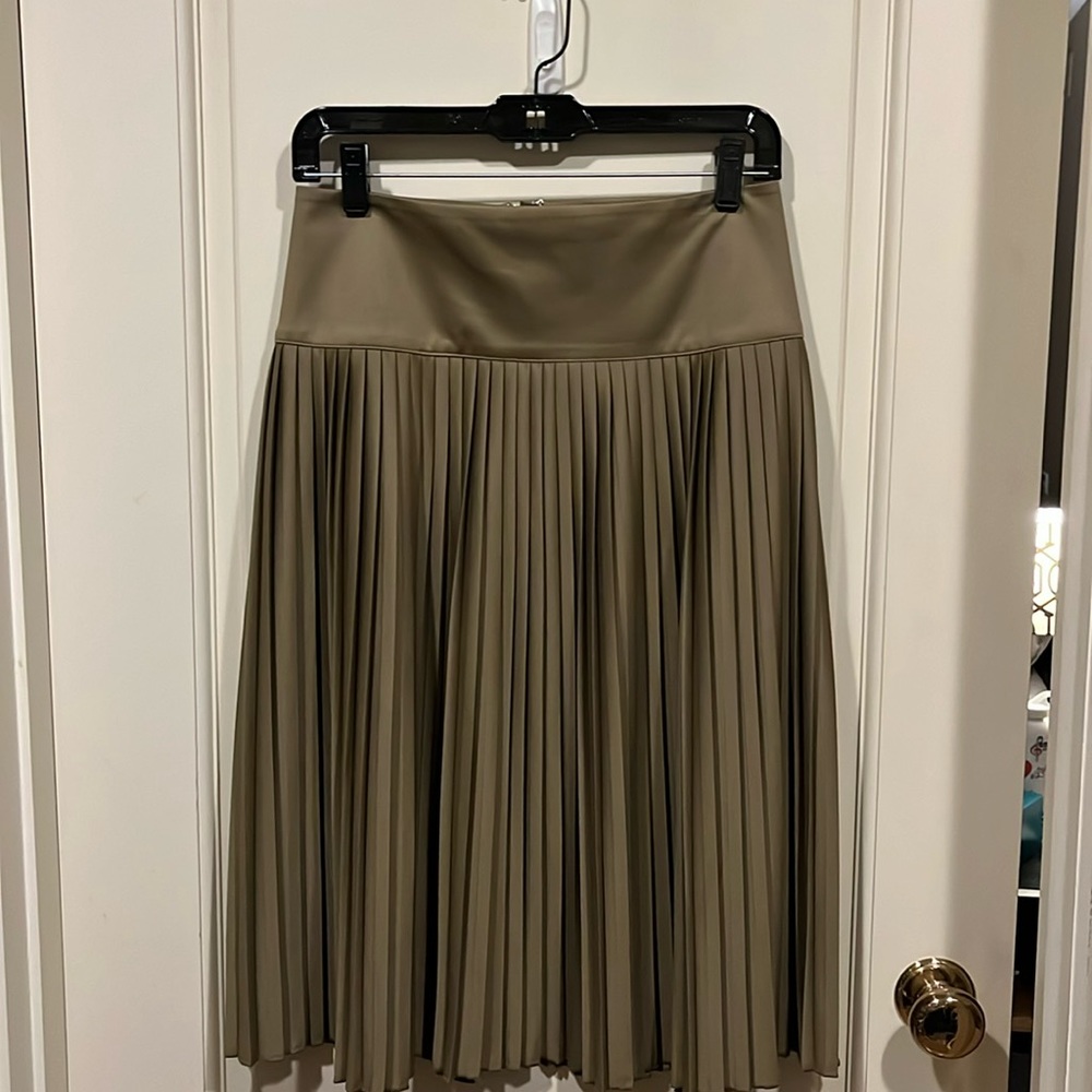 Gold pleated midi length skirt